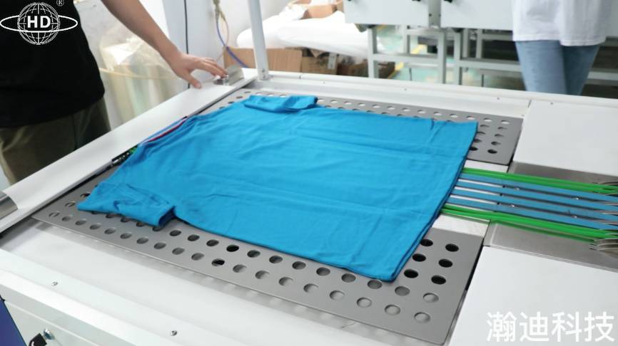 智能服装折叠机有效解决服装打包效率问题